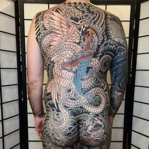 A massive piece in progress featuring a snake battling with an eagle by John Reardon (IG—johnreardontattoos). #eagle Japanese #JohnReardon #largescale #snake