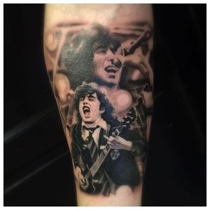 Black and grey AC/DC tribute tattoo by Jens Bergstrom. #realism #blackandgrey #music #band #ACDC #JensBergstrom