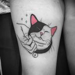 Sweetest cat tattoo by Noil Culture #NoilCulture #cattattoos #linework #popart #graphic #blackfill #illustrative #cat #hand #stars #petportrait #cute #bell #pink