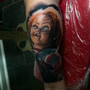 Chucky tattoo by Yogi Barrett. #Chucky #ChildsPlay #horror #doll #realism #colorrealism #YogiBarrett