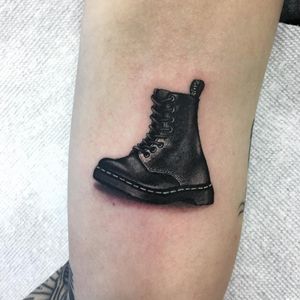 Docs tattoo by Dan Smith #dansmith #drmartens #combatboots #boots #shoes #blackandgrey #realism #realistic #hyperrealism