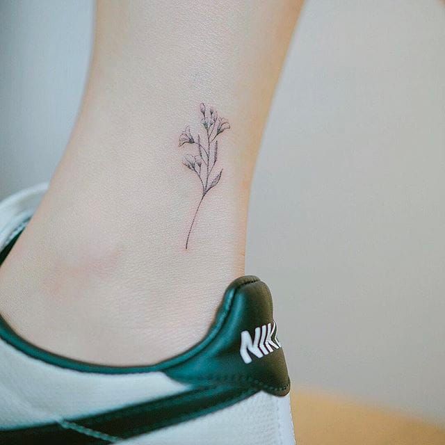 Small Flower Tattoo Sticker on Child Ankle Dress Up Tattoo Stock Photo   Image of lady close 140334502