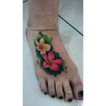 Vibrant Frangipani Foot Tattoo by @paudy_tattoos #frangipani #plumeria #vibrant #color #paudy_tattoos #flower