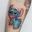 Watercolor leg tattoo