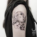 Lion tattoo by Goyo. #Goyo #subtle #fineline #southkorean #reindeerink #blackandgrey #floral #lion