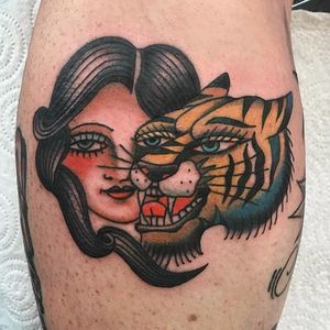 American Traditional tiger portrait tattoo by Cécile Pagès. #CecilePages #americantraditional #woman #portrait #tiger