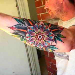 Flower mandala tattoo by Kirk Jones, photo from Good Luck Tattoo Facebook page. #flower #mandala #mandalatattoo #KirkJones #traditional