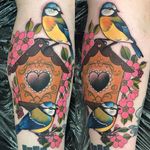 Two little birds enjoying their birdhouse. Tattoo by Charlotte Timmons. #birds #flowers #birdhouse #neotraditional #CharlotteTimmons