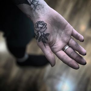 Rose palm tattoo by Alex Bawn #AlexBawn #handtattoos #blackwork #linework #dotwork #rose #flower #leaves #nature #Plant #palmtattoo #tattoooftheday