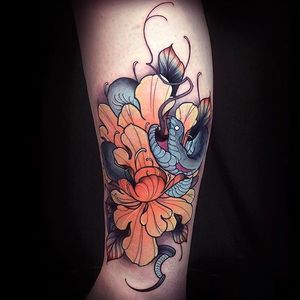 Stunning and vicious looking snake and peony tattoo done by Alexander Masom. #AlexanderMasom  #snake #peony #flower #coloredtattoo