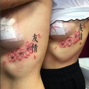 Matching cherry blossom tattoos by La Patty Inkheart (via IG -- lapattyinkheart) #LaPattyInkheart #friendshiptattoos #cherryblossoms