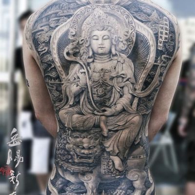 Epic Bodhisattva Manjushri backpiece by Heng Yue #newassasintattoo #HengYue #Buddhism #blackandgrey #portrait #portraiture #realism #realistic #lion #bodhisattva #clouds #lotus #throne #asian #stone #tattoooftheday