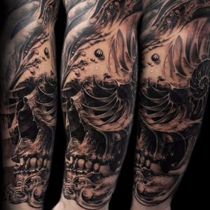 Nautilus skull morph tattoo by Tony Mancia #TonyMancia #morph #realistic #blackandgrey #skull #nautilus