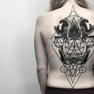 Otheser's (IG—otheser_dsts) skull tattoos look badass in large-scale, especially back-pieces. #geometric #largescale #minimalist #Otheser