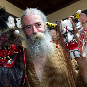 Jake Davies holds two of his Iwami-Kagura masks via The Japan Times #hannya #hannyamask #japanese #demon #femaledemon #tattooinspiration