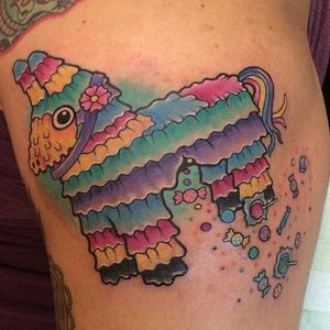Piñata spewing out candy. Tattoo by Erikka James. #traditional #candy #pinata #ErikkaJames #inspiration