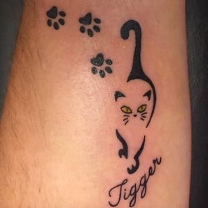 Memorial kitty tattoo with paw prints by Rebecca Fedun #luckycat #longislandtattooshop #longislandtattooartist #cat #lettering #memorialtattoo #pawprint #rebeccafedun #blackwork
