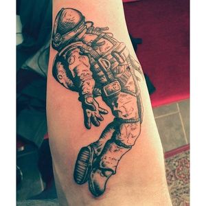 Embracing the sun, by Tanner Steele #TannerSteele #astronauttattoo