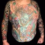 Incredible bodysuit by Henning Jorgensen #HenningJorgensen #Japanese #color #bodysuit #oni #yokai #demon #clouds #leaves #tigerprint #rope #monster #folklore #nature #deity #tattoooftheday