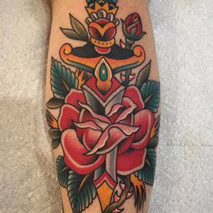 A rose for a rose by Chris Stuart #ChrisStuart #neotraditional #traditional #color #rose #sword #knife #flowers #leaves #nature #rosebud #tattoooftheday