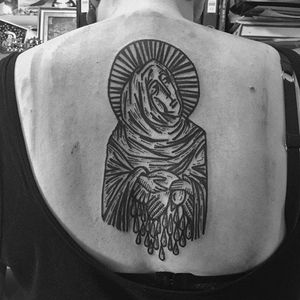 Saint and offering tattoo by @kolahari #kolaharitattoo #black #blackwork #linework #thecirclelondonsoho #esoteric