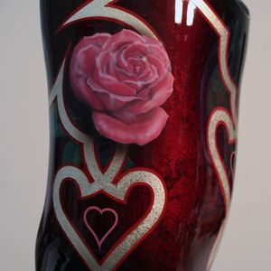 A lovely rose painted on a prosthesis by Prosthetic Ink. #amputees #DanHorkey #ProstheticInk #rose #tattooedprostheses #veterans