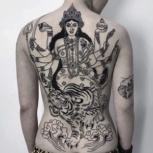 Durga Maa tattoo by Helen Hitori #HelenHitori #blackworktattoos #blackwork #linework #Hindu #goddess #deity #DurgaMaa #tiger #clouds #shell #trident #sword #bell #treasure #junglecat #lady #backpiece
