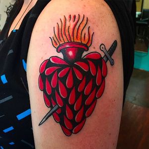 Awesome looking bleeding heart with a dagger through it. Tattoo by Jacob N. #JacobN #traditionaltattoo #boldtattoo #oldschool #heart #dagger #traditional