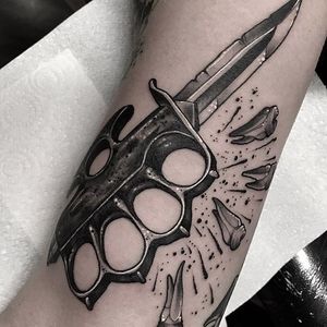 Tattoo uploaded by Ross Howerton • An intense brass-knuckle knife punching  out some teeth by Neil Dransfield (IG—neil_dransfield_tattoo).  #brassknuckles #black #dark #knife #NeilDransfield #neotraditional #teeth •  Tattoodo