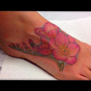 Neo traditional freesia tattoo by Sam Andrews. #freesia #flower #botanical #neotraditional #SamAndrews