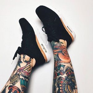 Tattoos and Nike shoes look pretty awesome together, image via Instagram @thesoundofbreakingup #nike #sneakers #nikesneakers #tats
