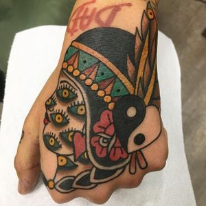 Hand tattoo by Sinsentido10 #Sinsentido10 #handtattoos #color #traditional #surreal #yinyang #heart #nativeamerican #feathers #rose #eyes #thirdeye #ladyhead #pattern #tattoooftheday