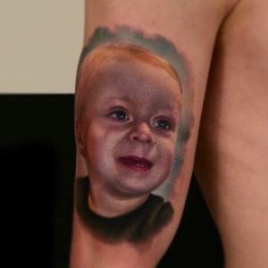 Sweet Realistic Portrait Tattoo of a smiling baby via @Karolrybakowski #PolandRybnik #InkognitoTattoo #Realistic #Painter #Style #Child #Children #portrait #baby