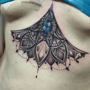 Delicate dotwork sternum and gem piece by Samm Lacey.