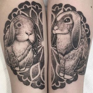 A pair of matching bunny tattoos by Lawrence Edwards (IG—feraleyes). #animals #blacktattoo #bunnies #lawrenceedwards #pointillism