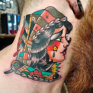 Insane looking girl head tattoo on the neck. Really nice tattoo by Eddie Czaicki. #eddieczaicki #girlhead #traditionaltattoo #razor #coloredtattoo