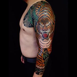 Rowdy tiger by RG74 #rg74 #color #japanese #tiger #junglecat #cat #stripes #bamboo #animal #wildlife #jungle #clouds #fangs #tattoooftheday