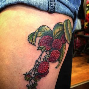 Plump and juicy raspberry branch tattoo by @conradism. #raspberry #fruit #botanical #neotraditional #conradism