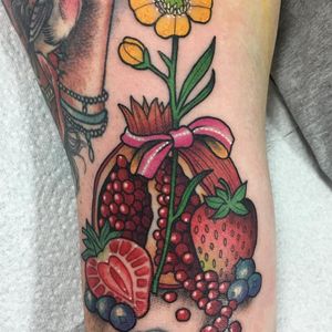 Fruit tattoo by Guen Douglas #GuenDouglas #colortattoo #neotraditionaltattoo #newtraditionaltattoo #pomegranatetattoo #fruittattoo #strawberrytattoo #blueberrytattoo #flowertattoo #foodtattoos #tattoooftheday