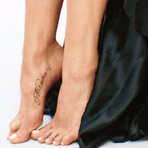 Jennifer Aniston's tattoo dedicated to her dog Norman. #celebrities #pets #jenniferaniston