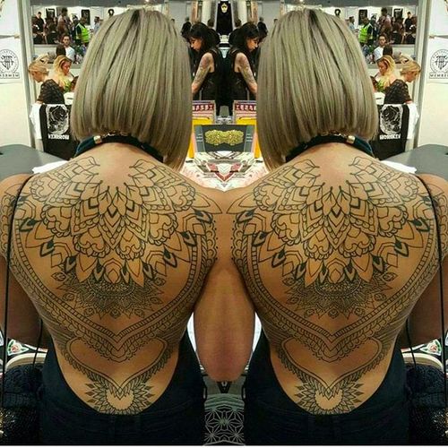 Cool upper back tattoo done by Keegan Sweeney. #KeeganSweeney #keegstattoo #geometrictattoo #backpiece