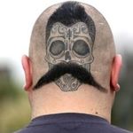Talk about having eyes in the back of your head. We really admire the extra commitment to the bit. #sugarskull #moustache
