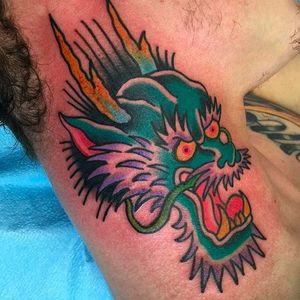 Dragon head tattoo on neck done by Billy White. #dragon #dragonhead #tattoo #dragontattoo #necktattoo #billywhite