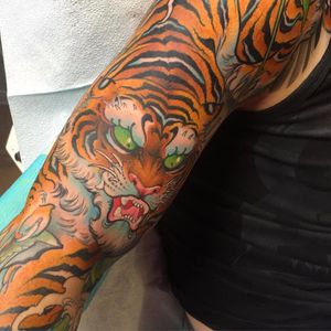 Tiger sleeve by James Tex #JamesTex #Japanese #color #tiger #cat #junglecat #fangs #fur #nature #animal #tattoooftheday