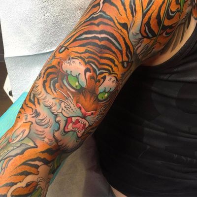 Tiger sleeve by James Tex #JamesTex #Japanese #color #tiger #cat #junglecat #fangs #fur #nature #animal #tattoooftheday