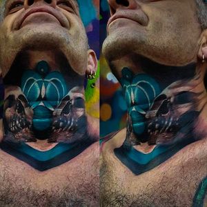 Insane skulls on the neck tattoo by Craig Cardwell. #CraigCardwell #surreal #painterly #skulls #necktattoo