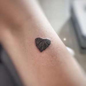 Kid's thumbprint tattoo by Duff Tattoo. #print #thumbprint #fingerprint #mom #momtattoo #momtattooidea #tattooideaformoms