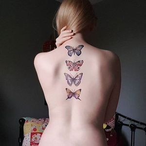 Butterflies adorning a spine, artist unknown. (via IG—mimitaraj) #Spine #Butterflies