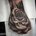Rose hand tattoo by Bobby Loveridge @bobbalicious_tattoo #black #blackandgray #churchyardtattoostudio #uk #rose