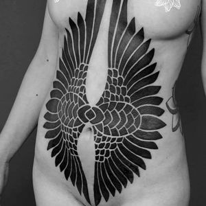 Tribal stomach piece tattoo by Abusevbiografikatattoo #abusevbiografikatattoo #blackworktattoos #blackwork #tribal #pattern #wings #abstract #geometric